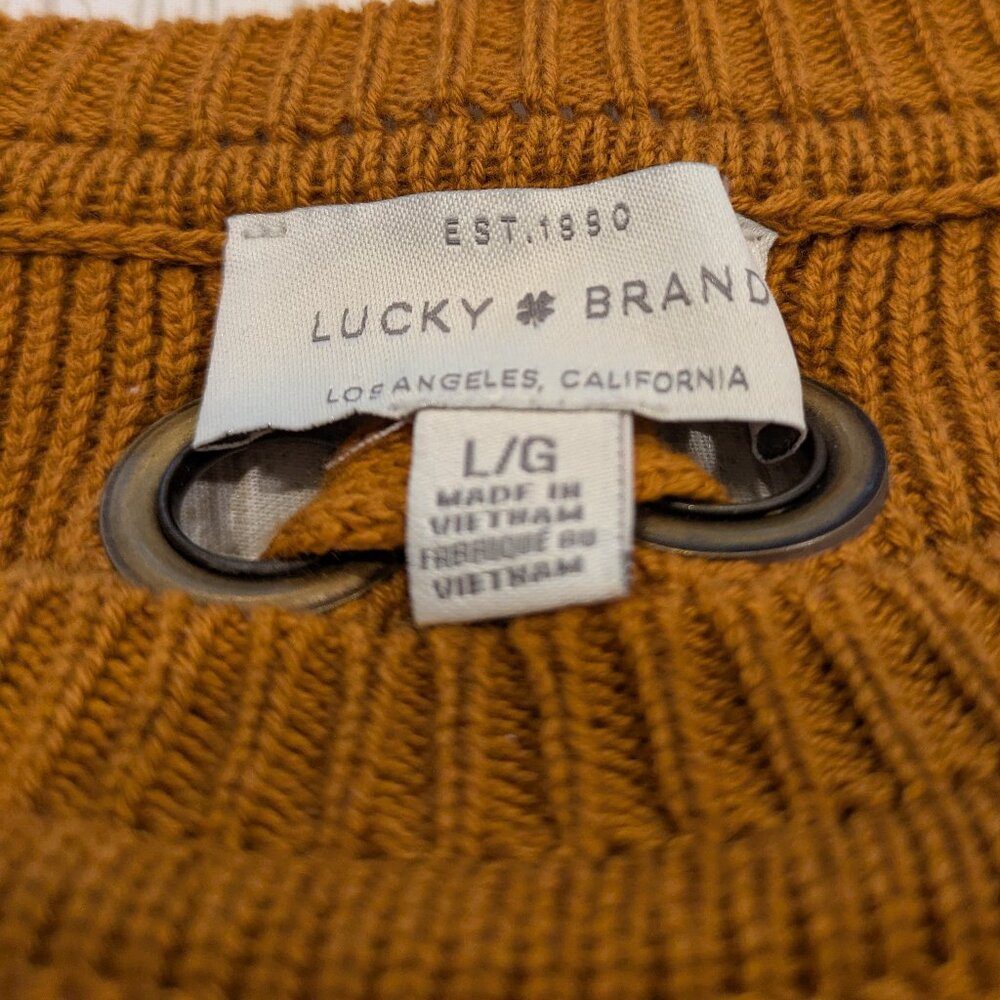 Lucky Brand Back Lace Pullover Sweater in burnt orange knit.